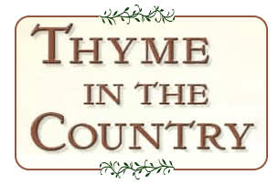 "Thyme in the Country" in an old-fashioned font with a graphic of a thyme sprig at the top and bottom.